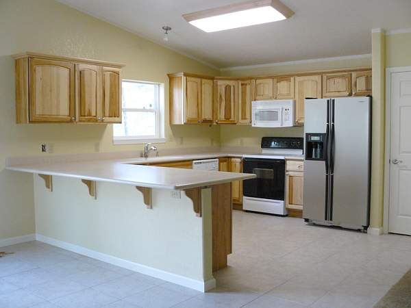 Kitchen Optional Hickory Cabinets and Solid Surface Counter Top
